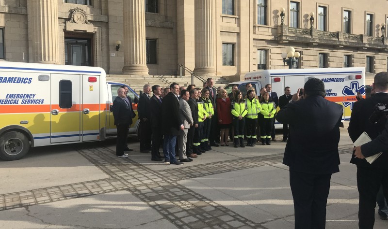 MLAs stand with paramedics at announcement