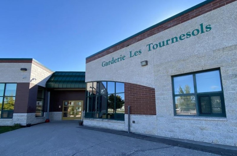 Exterior of daycare with sign